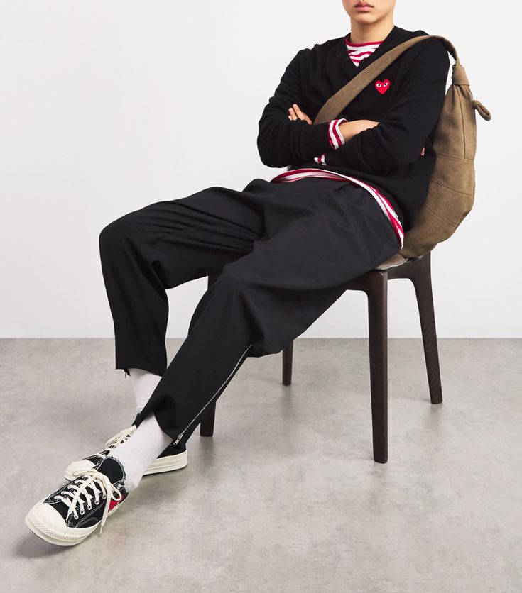 The now-iconic Comme des Garçons play logo was…