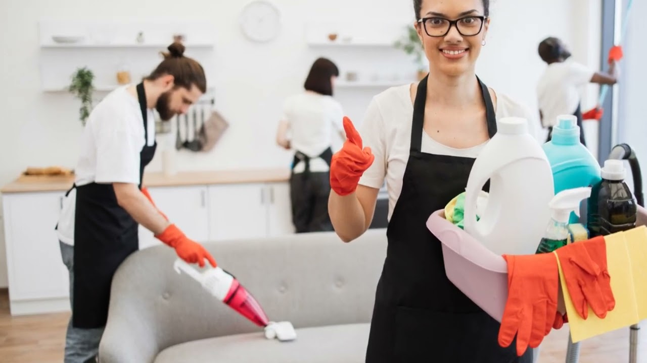 Professional cleaning team using eco-friendly products during House Clean Out Services Kent WA, preparing a living space for a fresh start.